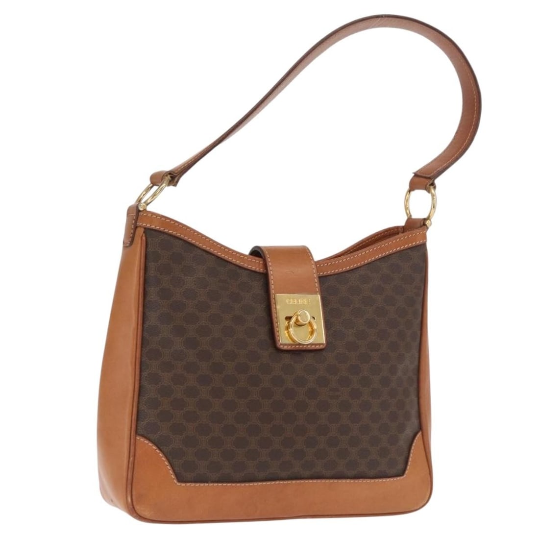 Brown Gold Macadam Canvas and PVC Leather Shoulder Bag with Pouch by CELINE: Brown Gold Macadam Canvas and PVC Leather Shoulder Bag with Pouch by CELINE This CELINE shoulder bag features a combination of brown Macadam canvas and PVC leather with gold-tone hardware. It includes