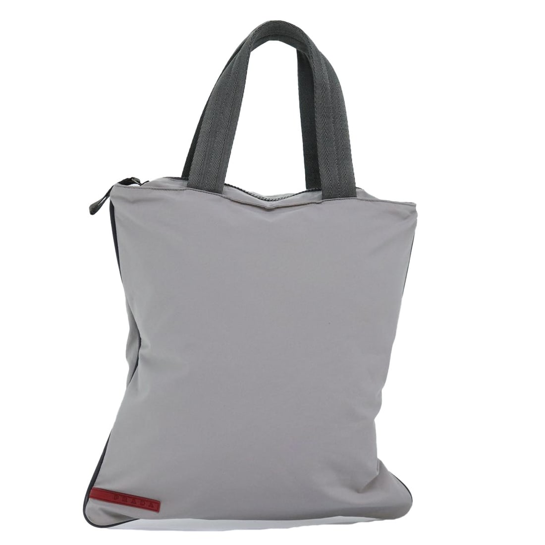 PRADA Gray Nylon Sports Tote Bag Made in Italy: PRADA Gray Nylon Sports Tote Bag Made in Italy Discover the elegance of Italian craftsmanship with this PRADA Sports Tote Bag. Crafted from durable gray nylon, this tote seamlessly combines functional