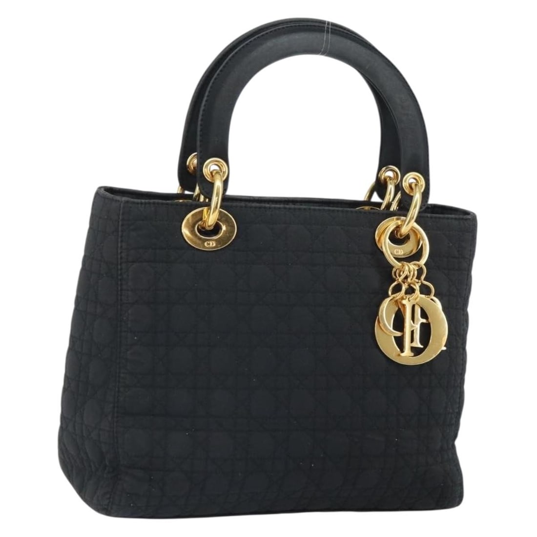 Lady Dior Black Nylon Handbag with Gold Hardware and Charm: Lady Dior Black Nylon Handbag with Gold Hardware and Charm This is a Christian Dior Lady Dior Canage handbag crafted from black nylon with gold-tone accents. The bag features dual top handles, a signa