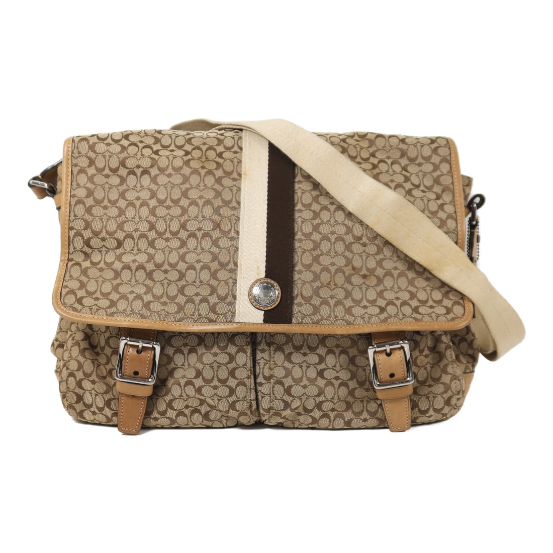 Canvas Beige Shoulder Bag by Coach with Silver Hardware: Canvas Beige Shoulder Bag by Coach with Silver Hardware This COACH shoulder bag features a beige canvas exterior and offers a spacious design suitable for everyday use. Made in the United States, it i