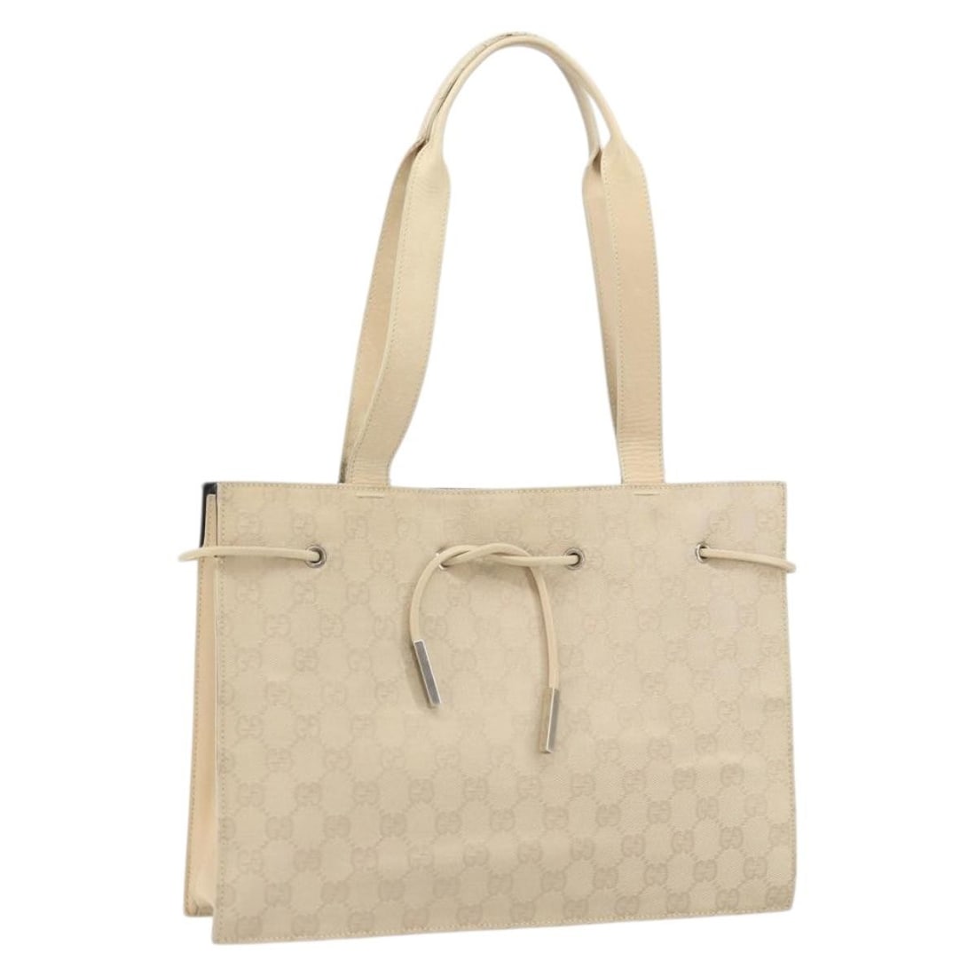Beige Silver GG Canvas Tote by Gucci 002 1053 Italy: Beige Silver GG Canvas Tote by Gucci 002 1053 Italy This GUCCI GG Canvas Tote Bag features a beige and silver color scheme and is crafted from the brand's signature GG canvas. Made in Italy, this tote