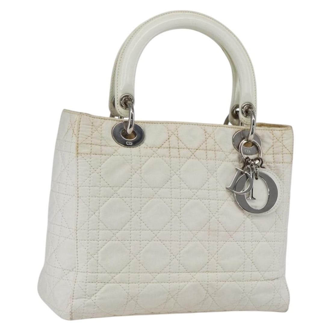 Lady Dior White Nylon Handbag with Silver Accents by Christian Dior: Lady Dior White Nylon Handbag with Silver Accents by Christian Dior This is a Christian Dior Lady Dior Canage handbag crafted from white and silver nylon with silver-tone hardware. The bag features du