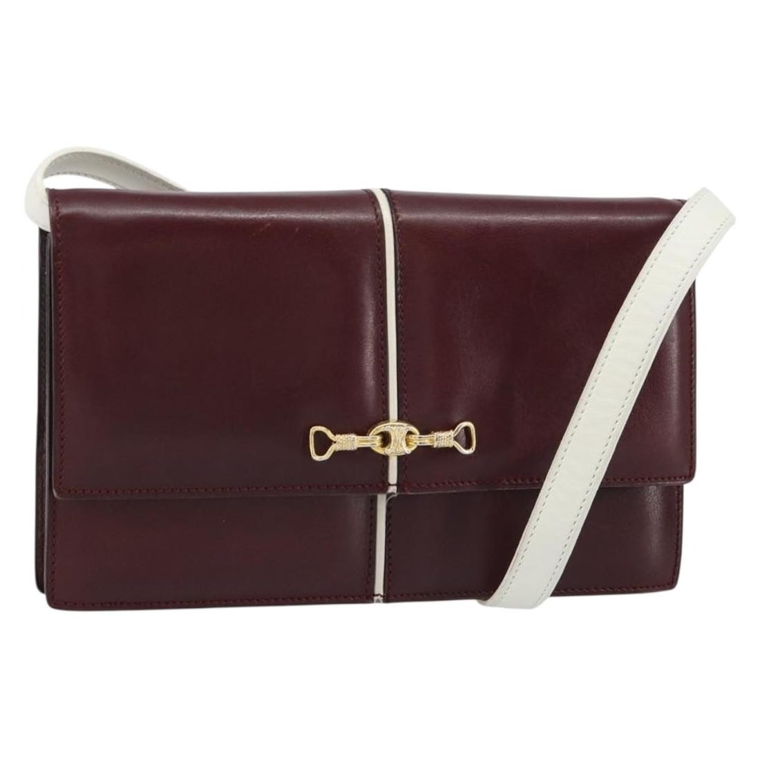 CELINE Bordeaux Leather Macadam Horsebit Gold Shoulder Bag: CELINE Bordeaux Leather Macadam Horsebit Gold Shoulder Bag This CELINE shoulder bag features the iconic Macadam pattern with horsebit detailing, crafted from bordeaux leather with gold-tone accents. M
