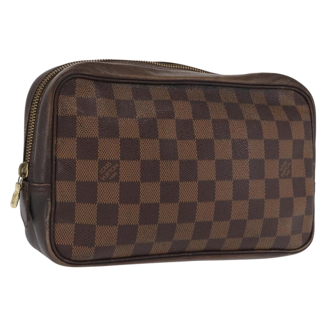 Damier Ebene Canvas Trousse Toilette 25 Clutch by Louis Vuitton N47624: Damier Ebene Canvas Trousse Toilette 25 Clutch by Louis Vuitton N47624 This is a Louis Vuitton Damier Ebene Trousse Toilette 25 clutch bag crafted from Damier Ebene canvas. The bag features a rectangu