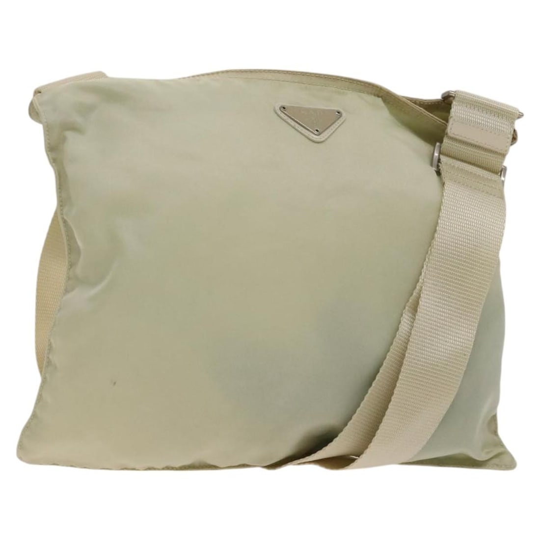 PRADA Cream Silver Nylon Shoulder Bag Made in Italy: PRADA Cream Silver Nylon Shoulder Bag Made in Italy This PRADA shoulder bag combines a stylish cream and silver design with practical functionality. Crafted from durable nylon, it features a spacious