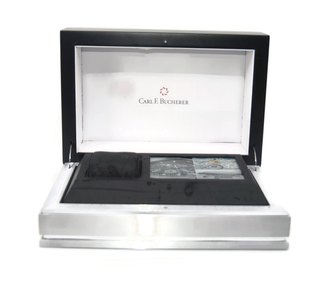 Authentic Carl F. Bucherer Presentation Watch Box 11 x 8 x 5 Inches: Authentic Carl F. Bucherer Presentation Watch Box 11 x 8 x 5 Inches This elegant presentation box by Carl F. Bucherer is designed to showcase your cherished timepiece. Measuring 11 x 8 x 5 inches, thi
