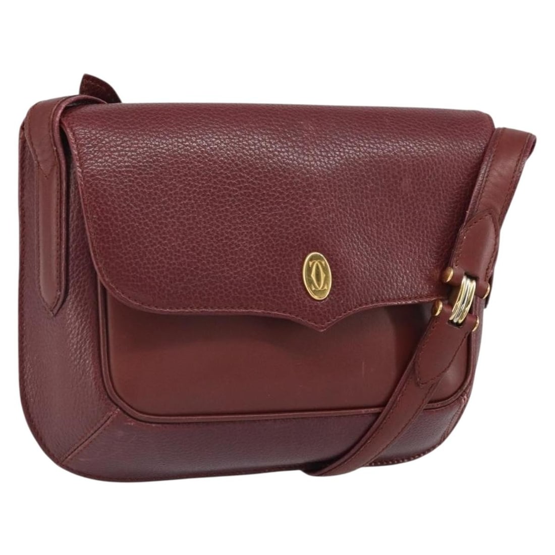 Cartier Must Line Bordeaux Leather Shoulder Bag with Gold Tone Accents: Cartier Must Line Bordeaux Leather Shoulder Bag with Gold Tone Accents This Cartier Must Line shoulder bag is crafted from bordeaux leather with gold-tone accents. The bag features an adjustable shoul