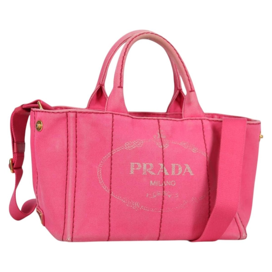 PRADA Canapa PM Pink Canvas Hand Bag Auth Made in Romania: PRADA Canapa PM Pink Canvas Hand Bag Auth Made in Romania The PRADA Canapa PM Hand Bag is a stylish accessory crafted from durable canvas in a vibrant pink hue. This hand bag features a spacious inter