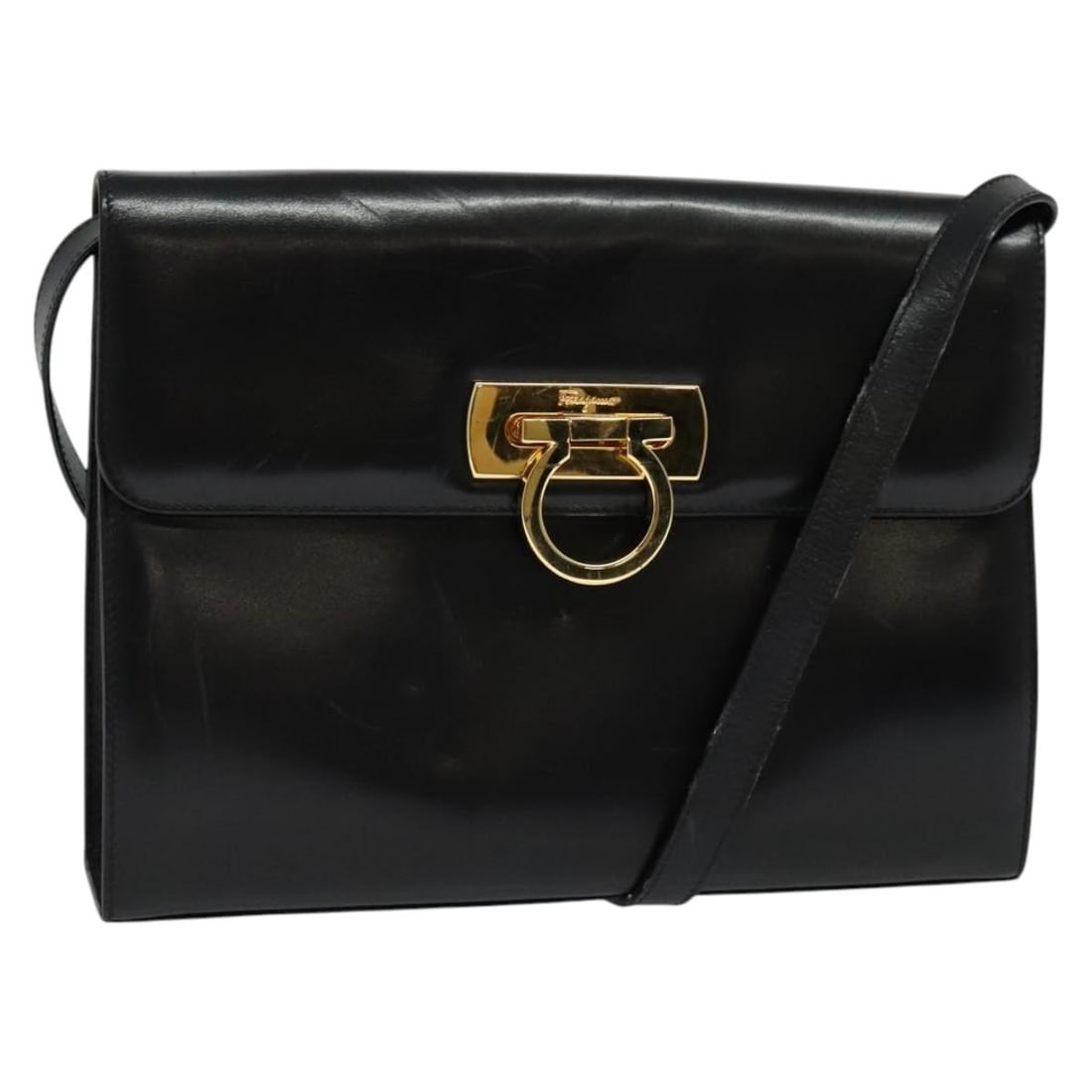 Salvatore Ferragamo Gancini Black Gold Leather Shoulder Bag Auth Italy: Salvatore Ferragamo Gancini Black Gold Leather Shoulder Bag Auth Italy Experience luxury with the Salvatore Ferragamo Gancini Shoulder Bag, a stunning blend of style and functionality. Crafted in Ital