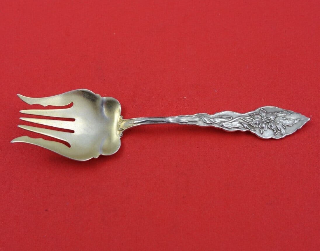 Unger Narcissus Sterling Silver Sardine Fork with Gold Wash 5 1/8": Unger Narcissus Sterling Silver Sardine Fork with Gold Wash 5 1/8" Introducing the Narcissus Sardine Fork by Unger, a stunning addition to your serving utensils. Crafted from high-quality sterling sil