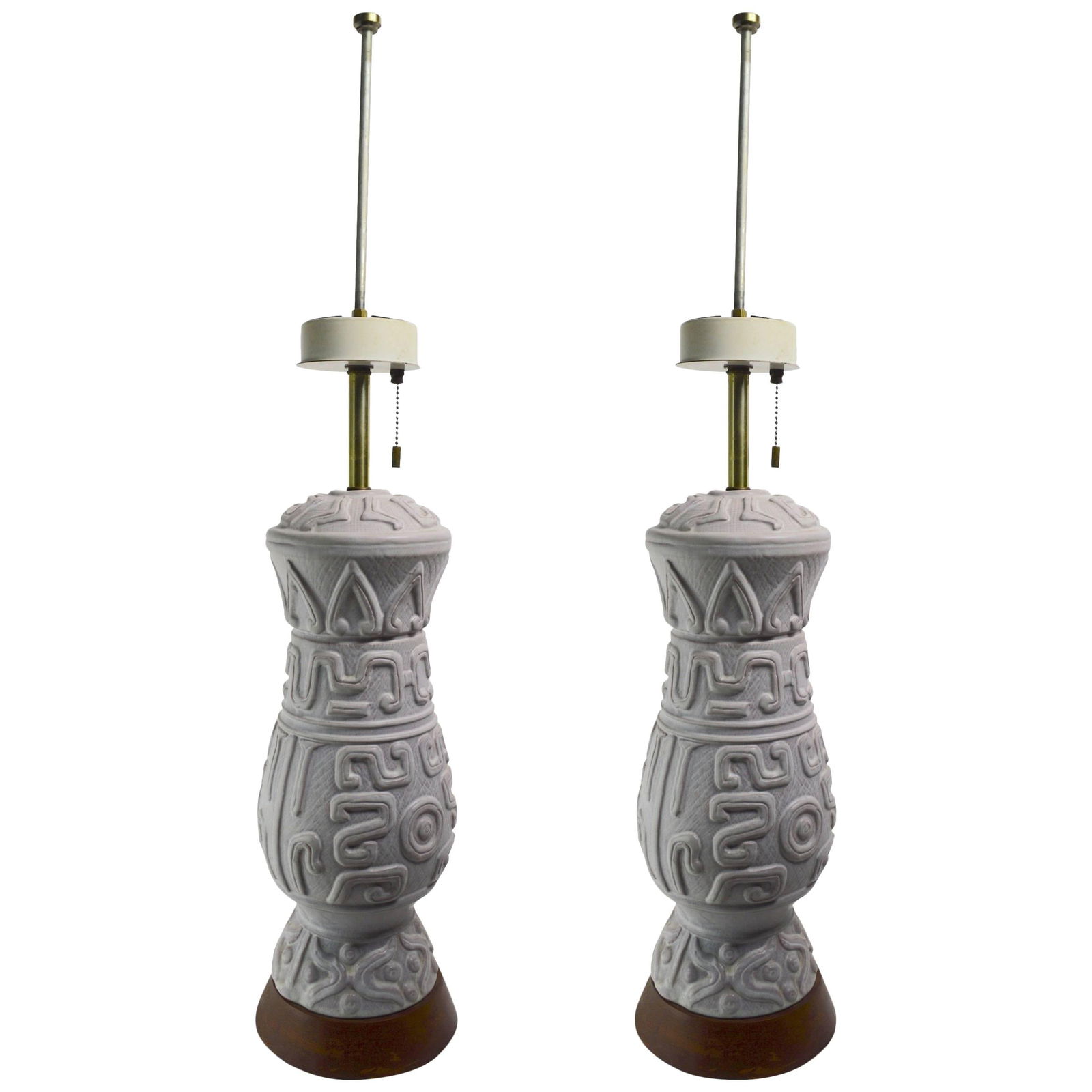 Stylish White Ceramic Lamps by Gerald Thurston for Lightolier - Pair: Stylish White Ceramic Lamps by Gerald Thurston for Lightolier - Pair This exquisite pair of ceramic lamps, designed by Gerald Thurston for Lightolier, showcases a stylish and sophisticated design infl