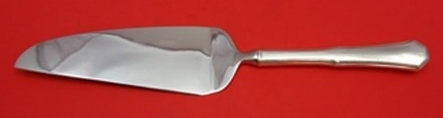 Reed and Barton American Federal Sterling Silver Pie Server Custom 11 1/8": Reed and Barton American Federal Sterling Silver Pie Server Custom 11 1/8" This exquisite pie server is a custom piece from Reed and Barton, crafted in the elegant American Federal pattern. Made from