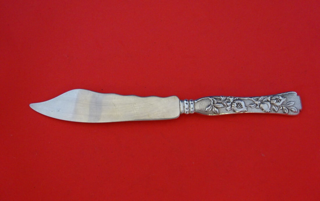 Tiffany & Co Vine Pattern Sterling Silver Fish Knife Pomegranate Motif: Tiffany & Co Vine Pattern Sterling Silver Fish Knife Pomegranate Motif This exquisite fish knife from Tiffany & Co. features the elegant Vine pattern, showcasing a beautiful pomegranate motif on its f