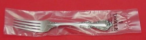 Towle Debussy Sterling Silver Regular Fork 7.5" New in Sleeve: Towle Debussy Sterling Silver Regular Fork 7.5" New in Sleeve Enhance your dining experience with this exquisite Debussy pattern regular fork by Towle. Crafted from high-quality sterling silver, this