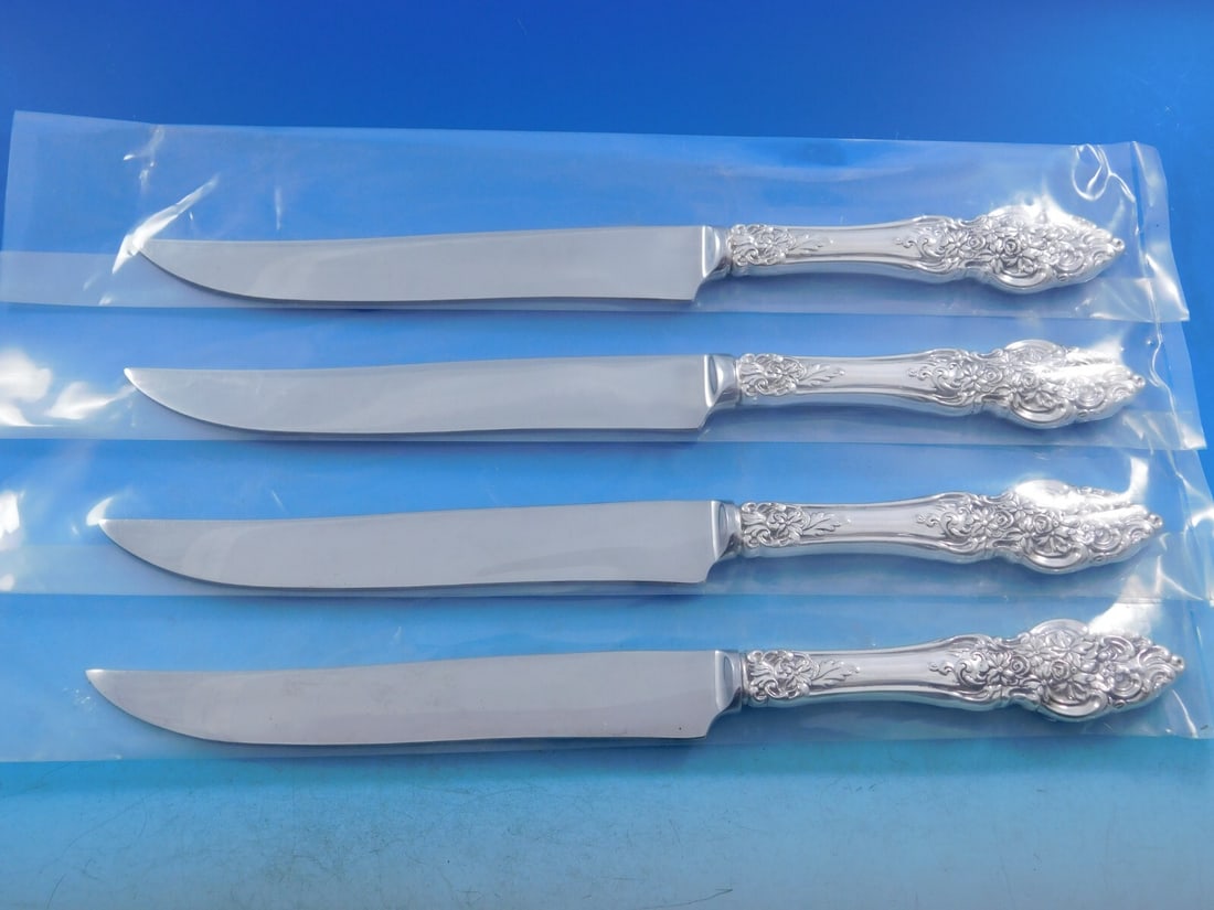 Reed and Barton Vienna Sterling Silver Steak Knives Set 4pc Texas Sized: Reed and Barton Vienna Sterling Silver Steak Knives Set 4pc Texas Sized Elevate your dining experience with this exquisite 4-piece steak knife set from Reed and Barton, featuring the elegant Vienna pa