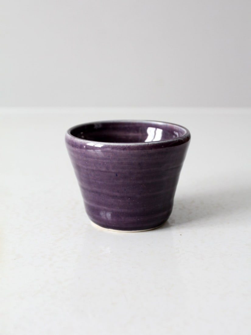 Artisan Vintage Studio Pottery Bowl Mulberry Purple Glaze Signed: Artisan Vintage Studio Pottery Bowl Mulberry Purple Glaze Signed This vintage studio pottery bowl showcases a stunning mulberry purple glaze, beautifully complemented by its organic, hand-thrown shape