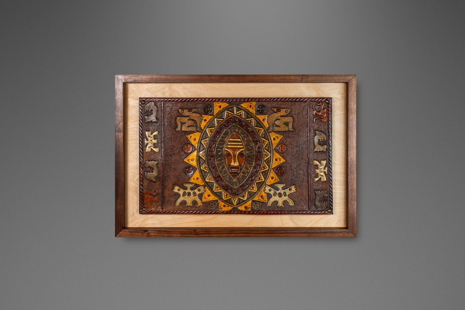 Angel Pazmino Framed Embossed Leather Art Incan Symbols 1960s: Angel Pazmino Framed Embossed Leather Art Incan Symbols 1960s This exceptional Mid-Century Modern framed embossed leather artwork showcases the talent of renowned Ecuadorian artisan Angel Pazmino, dat