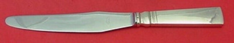 Georg Jensen Blok Acadia Sterling Silver Dinner Knife 9 3/4": Georg Jensen Blok Acadia Sterling Silver Dinner Knife 9 3/4" This exquisite dinner knife features a short handle design and is part of the Blok - Acadia pattern by the renowned designer Georg Jensen.