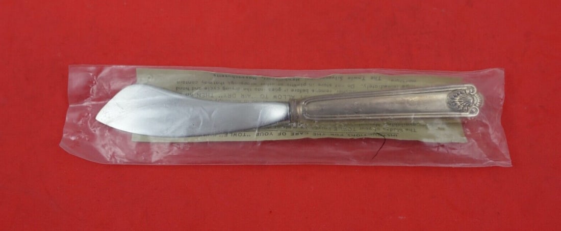 Frank Smith Fiddle Shell 7 Inch Sterling Silver Master Butter Knife: Frank Smith Fiddle Shell 7 Inch Sterling Silver Master Butter Knife This exquisite 7" master butter knife features the elegant Fiddle Shell pattern by renowned maker Frank Smith. Crafted from high-qua