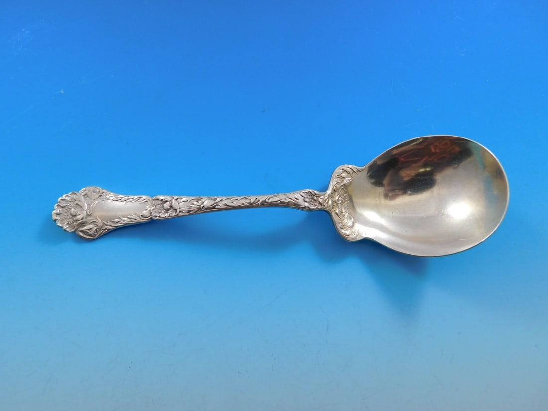 Gorham Poppy Sterling Silver 7 Inch Preserve Spoon: Gorham Poppy Sterling Silver 7 Inch Preserve Spoon Introducing the exquisite Poppy Preserve Spoon by Gorham, crafted from high-quality sterling silver. This elegant serving spoon features the beautifu