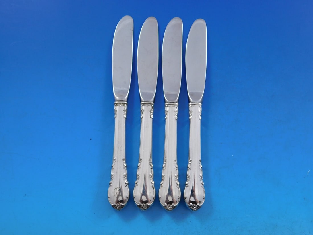 Lunt Modern Victorian Sterling Silver Butter Spreader Set of 4: Lunt Modern Victorian Sterling Silver Butter Spreader Set of 4 Enhance your dining experience with this exquisite set of four butter spreaders in the Modern Victorian pattern by Lunt. Crafted from hig