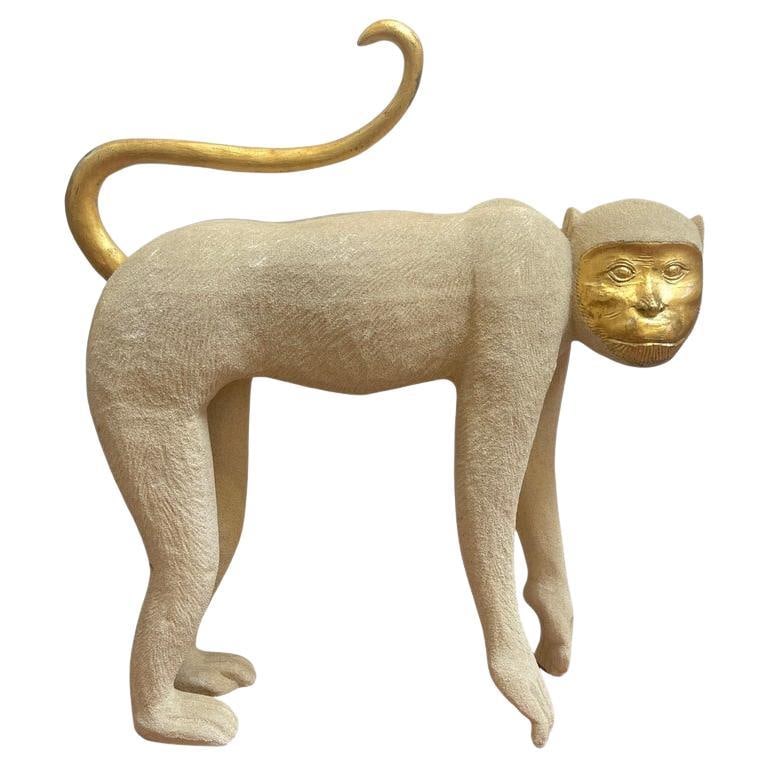 Life-Size 1980s White Gold Crouching Monkey Sculpture: Life-Size 1980s White Gold Crouching Monkey Sculpture This remarkable life-size Crouching Monkey Sculpture from the 1980s is a striking piece of modern art that embodies the playful and creative spiri