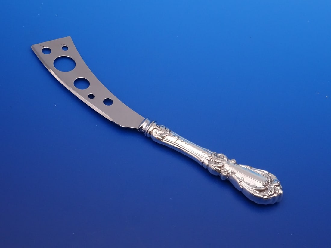 Reed and Barton Burgundy Sterling Silver 7 Inch Soft Cheese Knife: Reed and Barton Burgundy Sterling Silver 7 Inch Soft Cheese Knife This exquisite soft cheese knife from the Burgundy pattern by Reed and Barton is a must-have for cheese enthusiasts. Crafted from ster