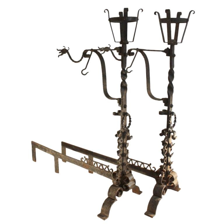 Large Brass Hand Wrought Gothic Arts and Crafts Andirons Pair: Large Brass Hand Wrought Gothic Arts and Crafts Andirons Pair This stunning pair of large hand-wrought Gothic Arts and Crafts andirons is a perfect blend of functionality and artistic craftsmanship. M