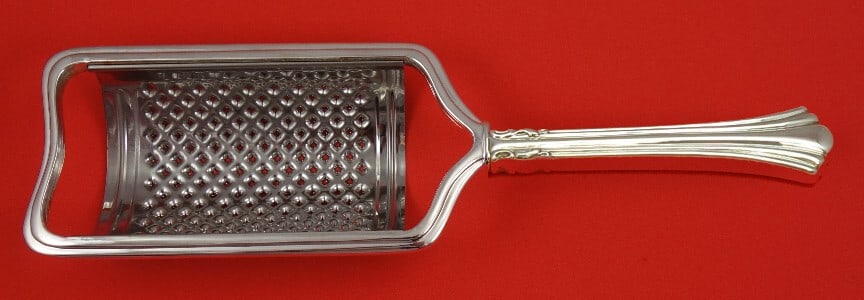 Reed & Barton Eighteenth Century Sterling Silver Curved Cheese Grater Custom 8.5": Reed & Barton Eighteenth Century Sterling Silver Curved Cheese Grater Custom 8.5" This exquisite cheese grater from Reed & Barton showcases the elegant Eighteenth Century pattern, expertly crafted in