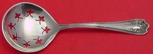 SSMC-Saart Blossom Sterling Silver Nut Spoon 5 3/8 Inches: SSMC-Saart Blossom Sterling Silver Nut Spoon 5 3/8 Inches This exquisite Blossom pattern serving spoon by SSMC-Saart is crafted from high-quality sterling silver. Measuring 5 3/8 inches, this elegant