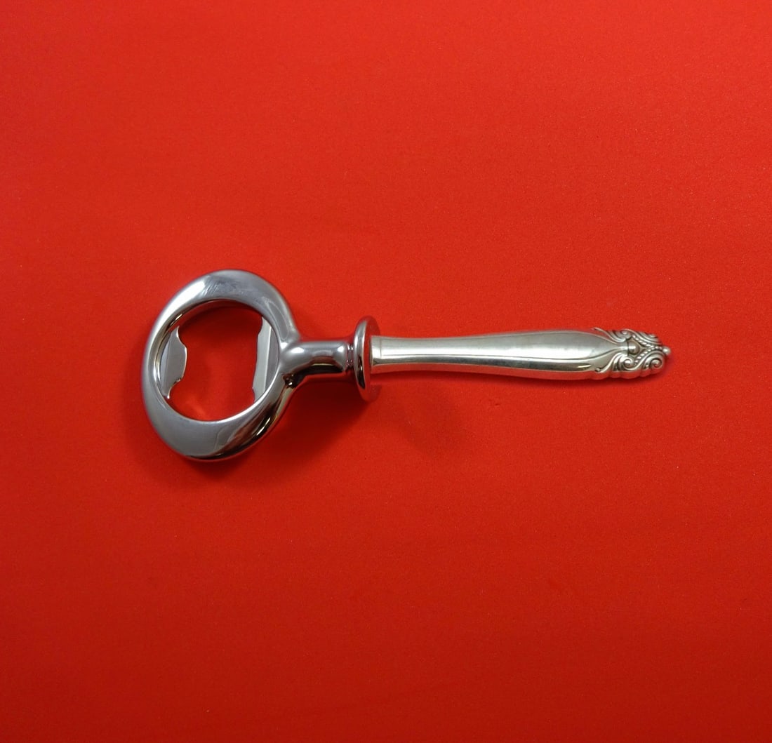 Wallace King Christian Sterling Silver Custom Bottle Opener 6": Wallace King Christian Sterling Silver Custom Bottle Opener 6" Introducing the King Christian bottle opener by Wallace, a perfect blend of elegance and functionality. Crafted from sterling silver with