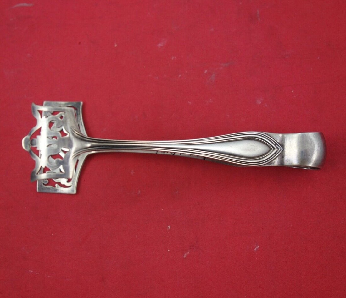 Watson King Philip Sterling Silver Sardine Tongs 5 3/8": Watson King Philip Sterling Silver Sardine Tongs 5 3/8" Presenting the King Philip sardine tongs by Watson, crafted from high-quality sterling silver. These elegant serving pieces boast a length of 5