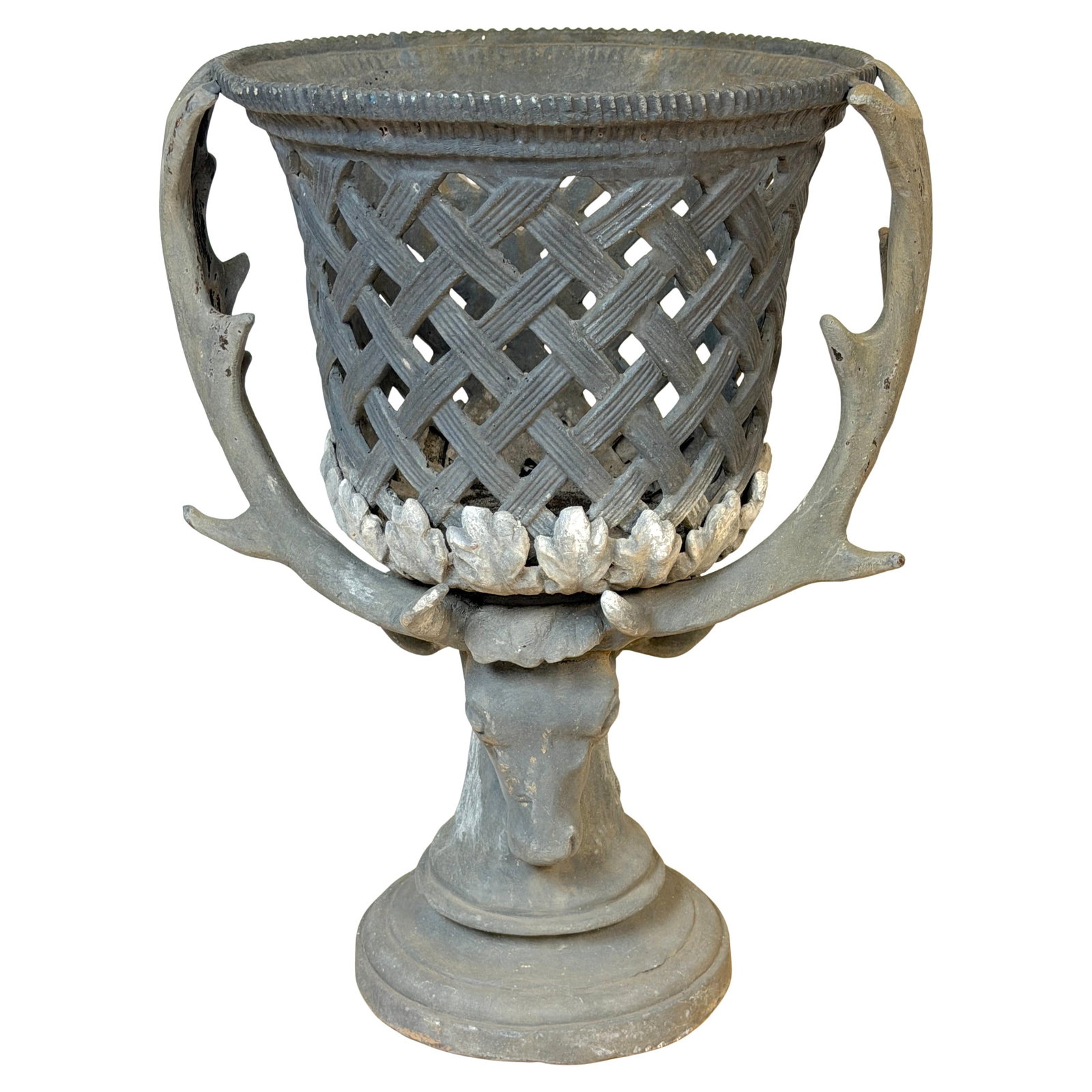 Polychrome Lead Urn with Reticulated Basket and Stag Head Attributed to J.W. Fiske: Polychrome Lead Urn with Reticulated Basket and Stag Head Attributed to J.W. Fiske This monumental urn, attributed to J.W. Fiske & Company, is crafted from polychromed cast lead and features a reticul