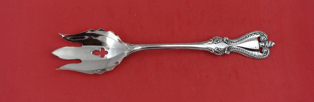 Towle Old Colonial Sterling Silver Slotted Serving Spoon 8 1/4 Inch: Towle Old Colonial Sterling Silver Slotted Serving Spoon 8 1/4 Inch This exquisite Old Colonial serving spoon by Towle is crafted from high-quality sterling silver. The spoon features a unique open-en
