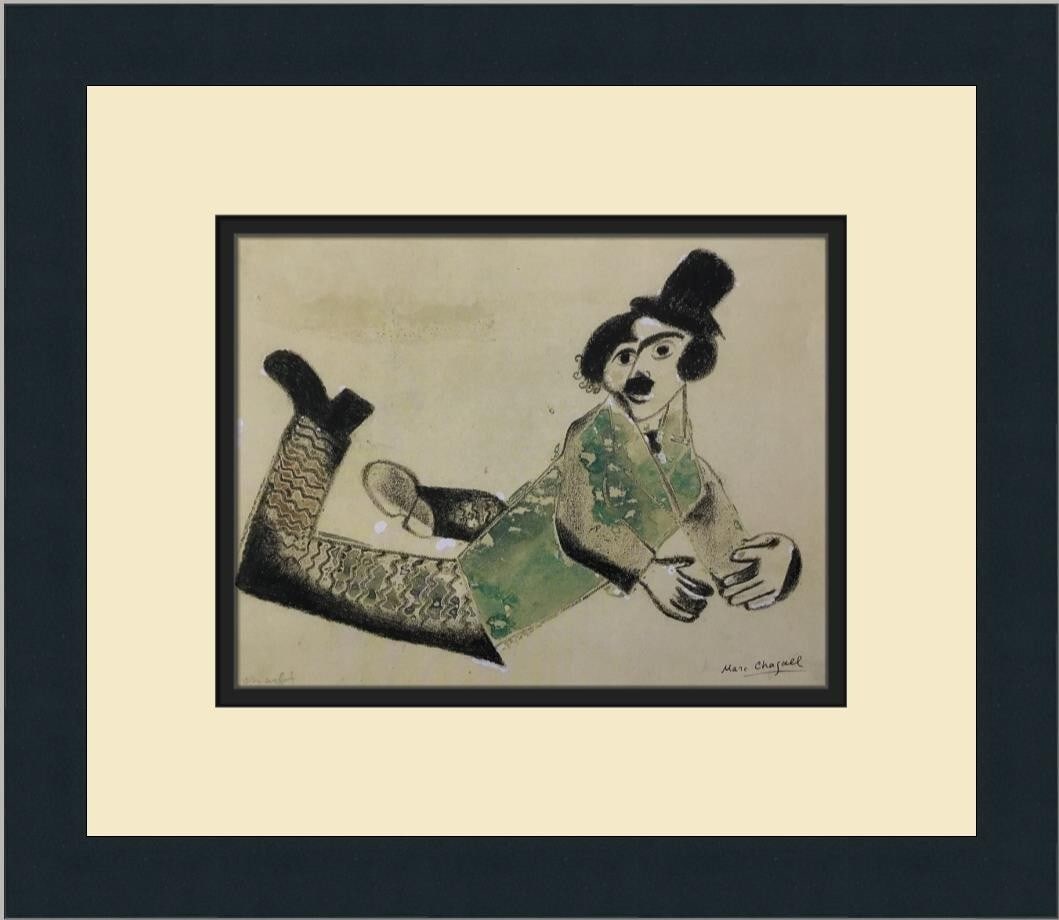 Marc Chagall Charlie Chaplin Custom Framed Offset Lithograph Print: Marc Chagall Charlie Chaplin Custom Framed Offset Lithograph Print Celebrate the iconic artistry of Marc Chagall with this custom framed print titled 'Charlie Chaplin.' Produced in 1973, this medium-s