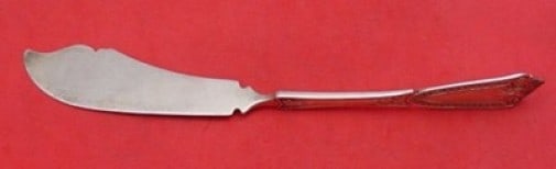 Ivy by Whiting-Hebbard Sterling Silver Twisted Master Butter Flat Handle: Ivy by Whiting-Hebbard Sterling Silver Twisted Master Butter Flat Handle This Ivy by Whiting-Hebbard master butter flat handle features a beautifully twisted design with a face motif, crafted from hig
