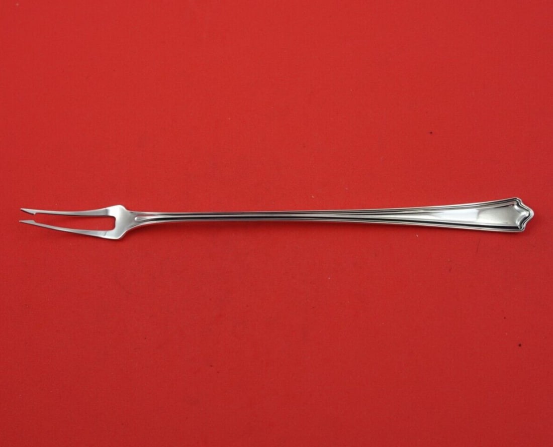 Whiting Portland Sterling Silver 2-Tine Pickle Fork 8 3/4" Serving: Whiting Portland Sterling Silver 2-Tine Pickle Fork 8 3/4" Serving This exquisite pickle fork features a stunning design from the Portland pattern by Whiting. Crafted from high-quality sterling silver