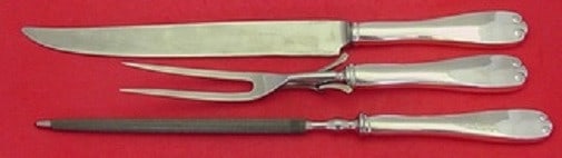 Tiffany & Co Flemish Sterling Silver 3-Piece Roast Carving Set: Tiffany & Co Flemish Sterling Silver 3-Piece Roast Carving Set This exquisite 3-piece roast carving set, crafted by Tiffany & Co., showcases the elegant Flemish pattern. Each piece features a sterling