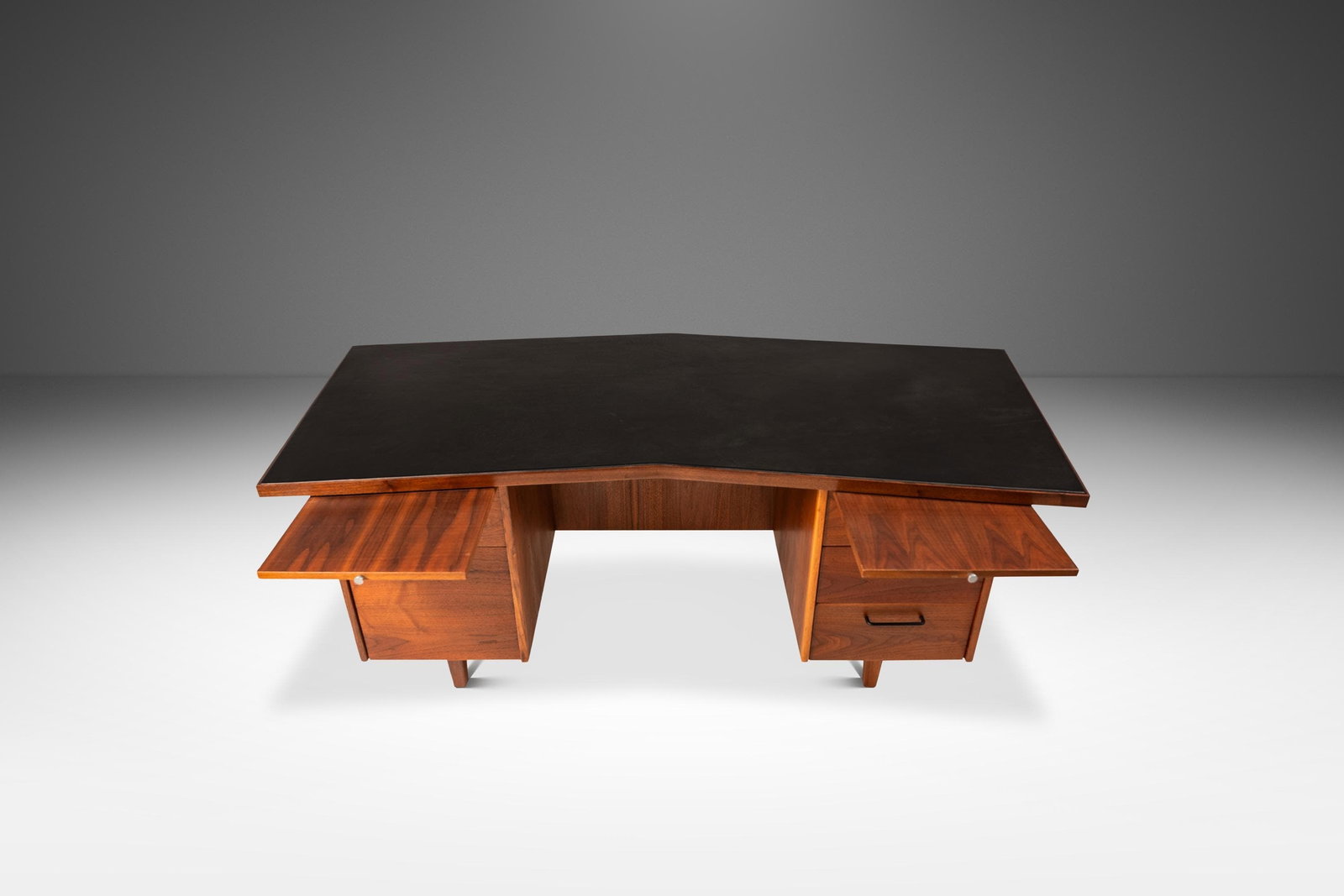 1960s Mid-Century Modern V-Shaped Walnut Desk After Harvey Probber: 1960s Mid-Century Modern V-Shaped Walnut Desk After Harvey Probber This stunning Mid-Century Modern V-Shaped Executive Desk, inspired by the designs of Harvey Probber, embodies the sleek sophisticatio