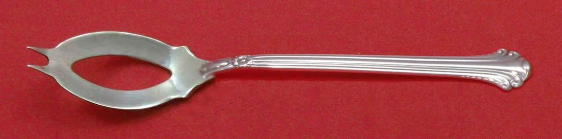 Towle Silver Plumes Custom 6 Inch Sterling Silver Olive Spoon: Towle Silver Plumes Custom 6 Inch Sterling Silver Olive Spoon This exquisite serving spoon is crafted in the Silver Plumes pattern by Towle, showcasing an elegant design perfect for enhancing your din