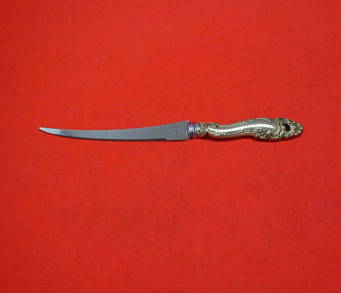 Gorham Decor Sterling Silver Custom Tomato Knife 7 5/8 inch: Gorham Decor Sterling Silver Custom Tomato Knife 7 5/8 inch This exquisite tomato knife features a custom-made design by Gorham, renowned for their exquisite silverware. Crafted with a hollow handle m
