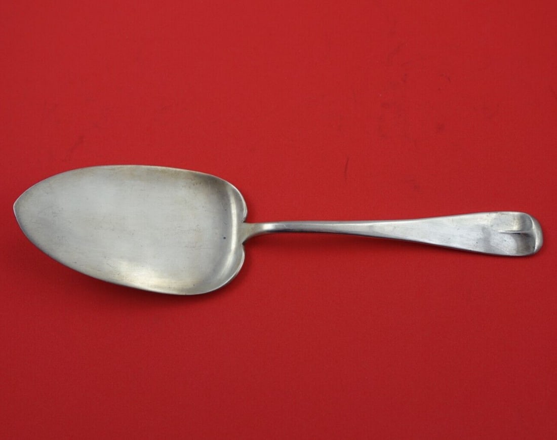 Erickson Silver Sterling Silver Cake Server 8 7/8 Inch Flat Handle: Erickson Silver Sterling Silver Cake Server 8 7/8 Inch Flat Handle This exquisite cake server by Erickson Silver is crafted from high-quality sterling silver (.925) and features a flat handle design.