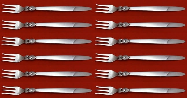 Georg Jensen Cactus Sterling Silver Cocktail Fork Set 12 pcs 6 1/4 Inch: Georg Jensen Cactus Sterling Silver Cocktail Fork Set 12 pcs 6 1/4 Inch Indulge in the elegance of the Cactus cocktail fork set by Georg Jensen, featuring 12 pieces crafted from high-quality sterling