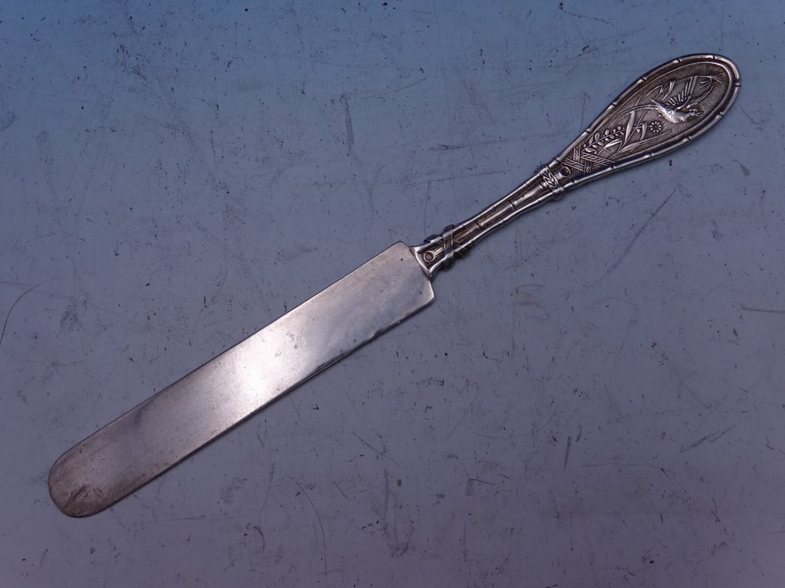 Whiting Japanese Sterling Silver Knife 7 Inch Flat Handle: Whiting Japanese Sterling Silver Knife 7 Inch Flat Handle This exquisite 7" regular knife features a flat handle and is crafted from all sterling silver. Designed by Whiting, it showcases the 'Japanes