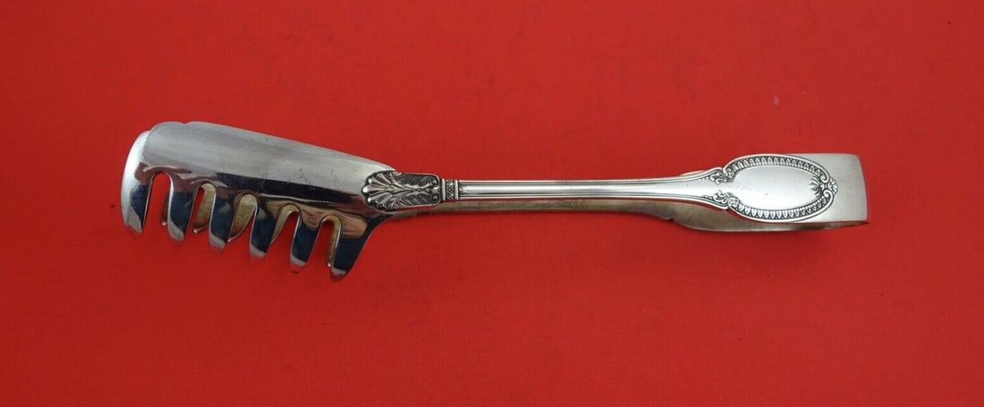 Italian Sterling Empire 9 1/4" Sterling Silver Pasta Tong: Italian Sterling Empire 9 1/4" Sterling Silver Pasta Tong Introducing the Empire Pasta Tong by Italian Sterling, a stunning serving piece crafted from high-quality sterling silver. Measuring 9 1/4" in