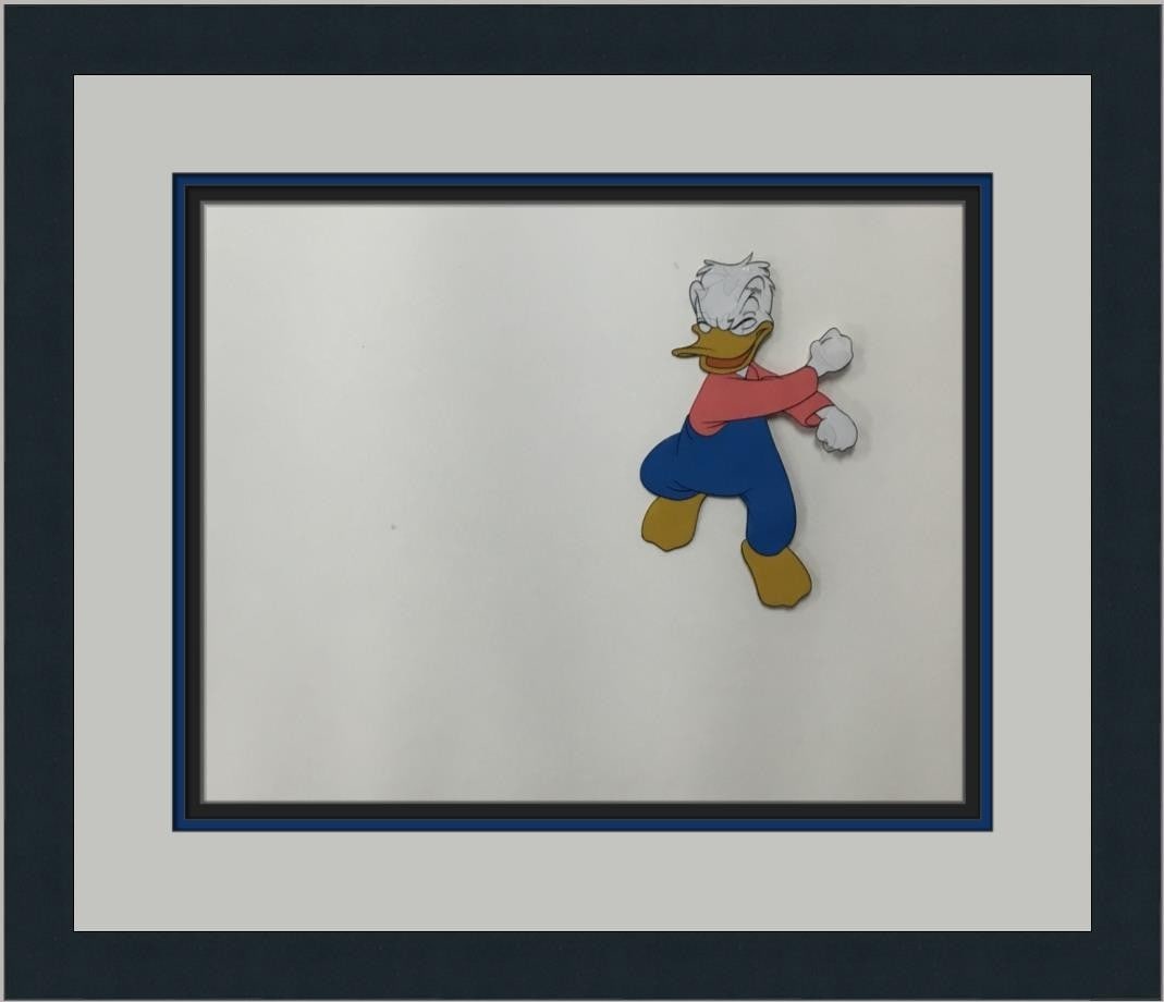 Donald Duck Disney Hand Painted Animation Production Cel Framed 1960: Donald Duck Disney Hand Painted Animation Production Cel Framed 1960 This is an original hand-painted animation production cel featuring Donald Duck from Disney. Created in the 1960s, this piece is an