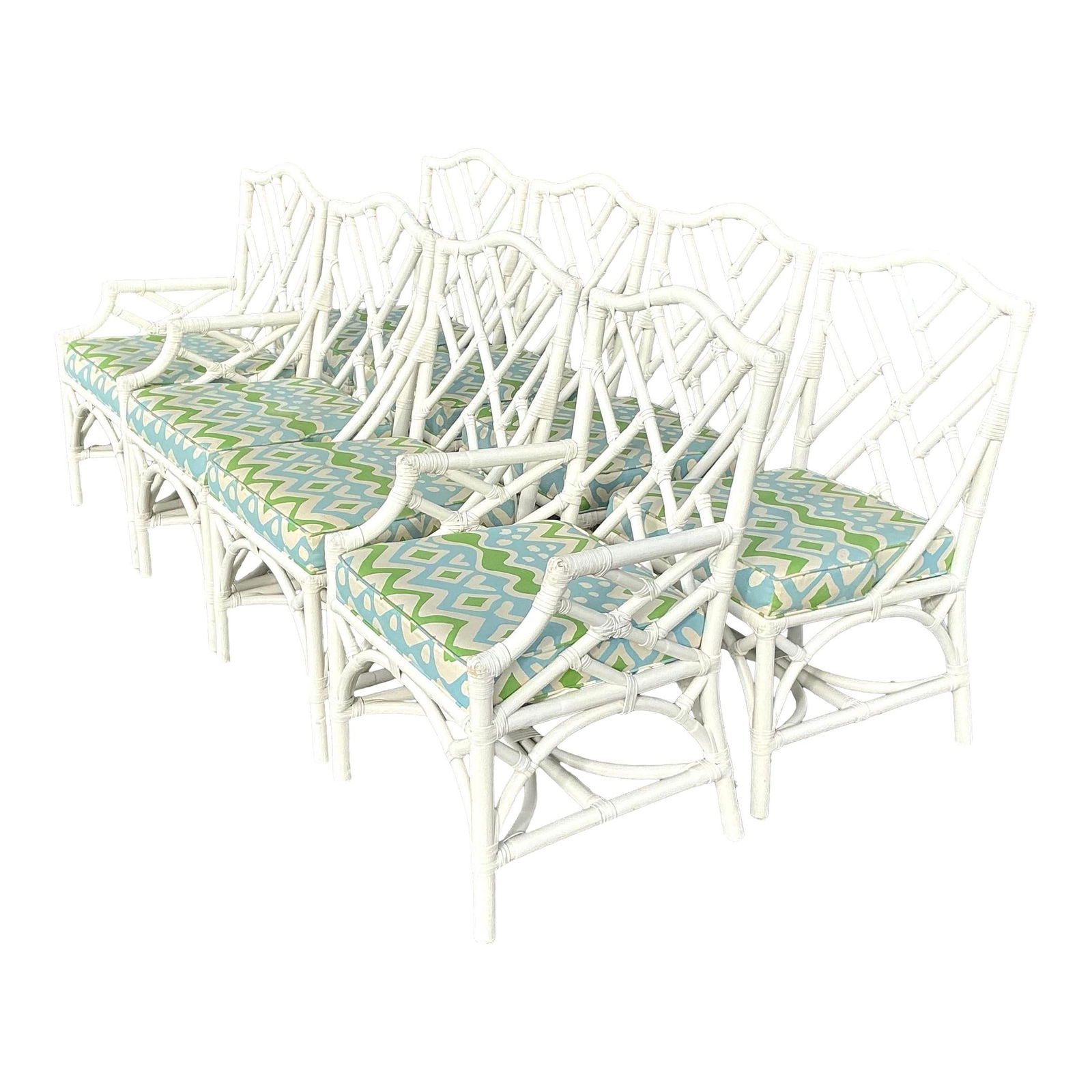 Set of 8 Vintage Coastal Chinese Chippendale Rattan Dining Chairs: Set of 8 Vintage Coastal Chinese Chippendale Rattan Dining Chairs Elevate your dining area with this exquisite set of eight vintage coastal Chinese Chippendale rattan dining chairs. Designed with intr