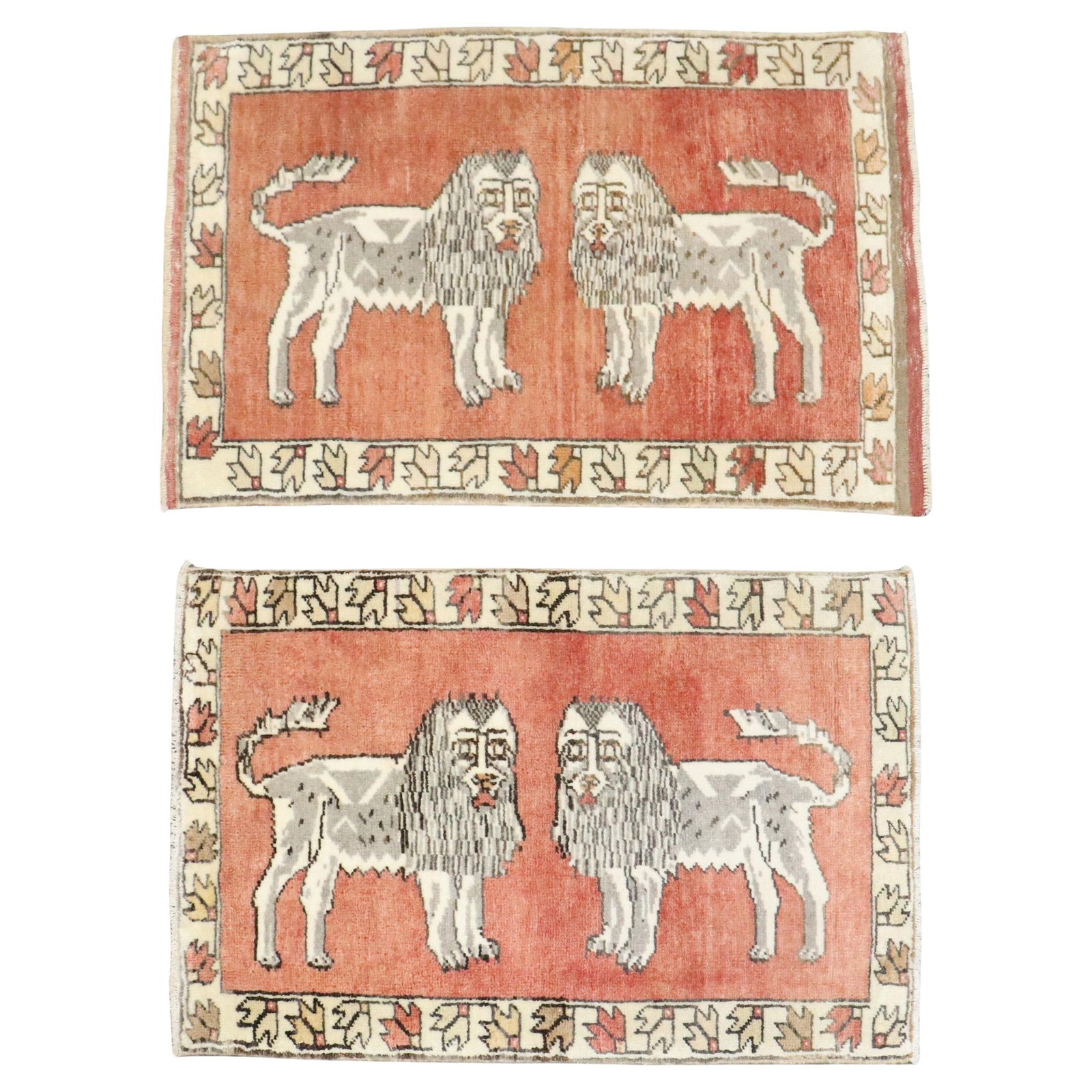 Set of 2 Vintage Turkish Wool Rugs with Lion Design: Set of 2 Vintage Turkish Wool Rugs with Lion Design This enchanting pair of vintage Turkish Anatolian rugs showcases a whimsical design featuring two lions on a rich rust background. Each rug is hand-