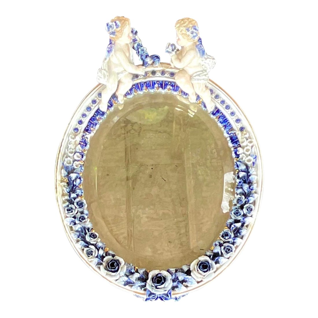 Vintage Blue White Glazed Ceramic Putti Cherub Mirror: Vintage Blue White Glazed Ceramic Putti Cherub Mirror Discover this stunning vintage Regency mirror featuring a beautiful blue and white glazed ceramic design adorned with charming Putti cherubs. This