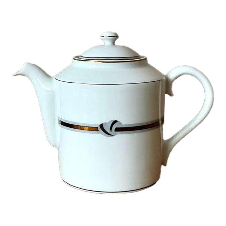 Rubanea Grey Porcelain Teapot With Lid By Christofle Vintage Boho Style: Rubanea Grey Porcelain Teapot With Lid By Christofle Vintage Boho Style This vintage Christofle "Rubanea Grey" teapot with lid features the graceful Rubanea ribbon motif in soft grey accents. Crafted
